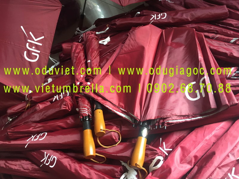 xưởng sản xuất ô dù cầm tay in logo quảng cáo